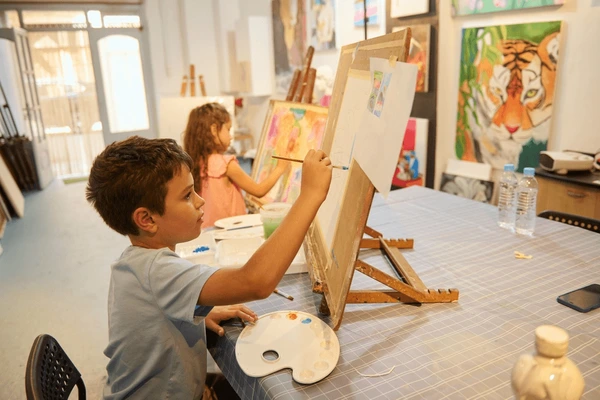 children enjoying art class painting 600nw 2473500545